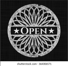 Open chalkboard emblem on black board