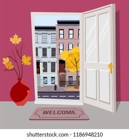 Open door into autumn city day sunny view with yellow trees. Door mat, vase with branches. Flat cartoon textured pink vector illustration. Three-four-story uneven colorful houses. Street cityscape.