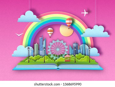 Open fairy tale book with city landscape and ferris wheel. Cut out paper art style design