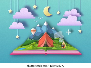 Open fairy tale book with Mountains landscape and camping. Cut out paper art style design