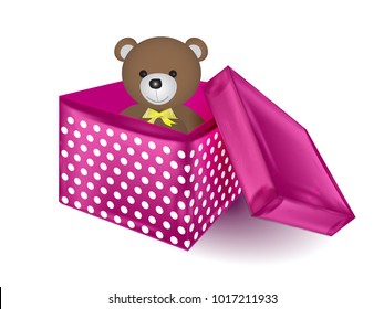 Open festive gift box red or red-burgundy with toy. Tied with pink ribbon with a bow on top.
