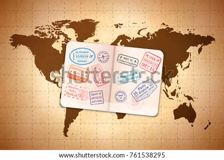 Open foreign passport with international visa stamps on ancient world map on old textured paper
