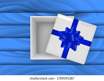 Open Gift box with blue bow on a wooden board. Vector stock illustration for poster