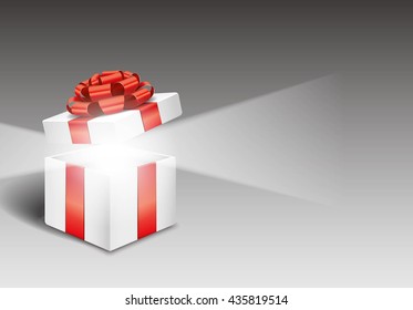 Open gift box with bright light