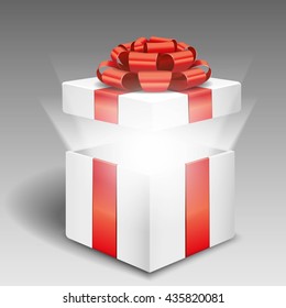 Open gift box with bright light