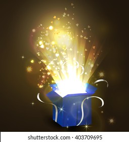 Open gift box with bright rays of light 