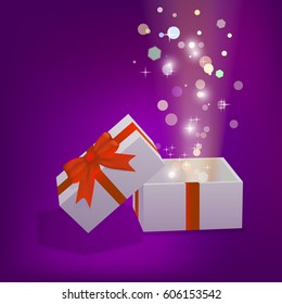 Open gift box with bright rays of light vector EPS10