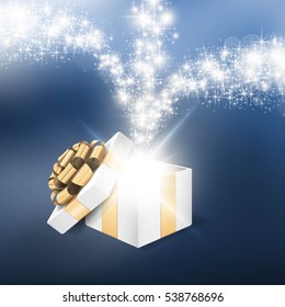 Open gift box with shiny star light