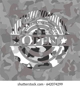 Open grey camouflaged emblem