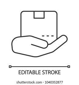 Open hand with parcel linear icon. Delivery service. Thin line illustration. Cargo insurance. Contour symbol. Vector isolated outline drawing. Editable stroke