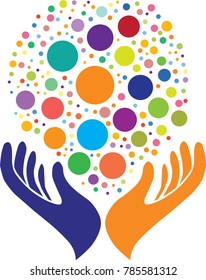 Open hands holding multiple colorful circles. Concept for shelter, care or protection