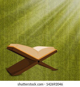 Open Islamic religious holy book Quran Shareef on green background.