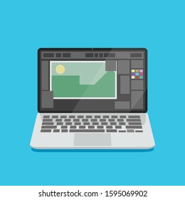 open laptop with design application