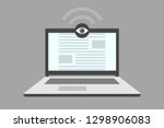Open laptop, and webcam with an eye, as a symbol of user tracking and spying
