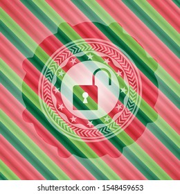 open lock icon inside christmas colors style emblem.