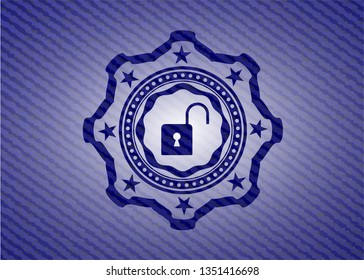 open lock icon inside emblem with jean background