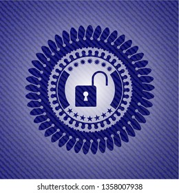open lock icon inside emblem with jean texture