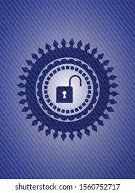 open lock icon inside jean or denim emblem or badge background