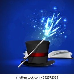 Open magic book, magic hat and wand with bright lights.