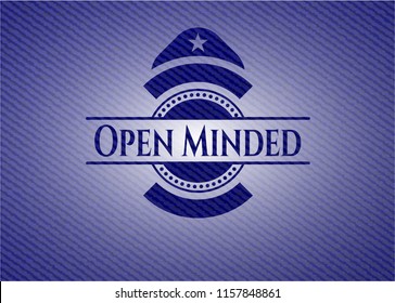 Open Minded badge with denim background