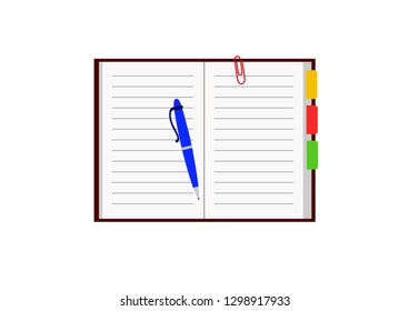 Open notebook with colored bookmarks, ballpoint pen and paper clip