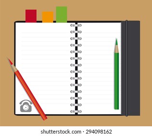 open notebook and colored pencils