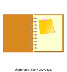 Open notebook with yellow sticker on white background