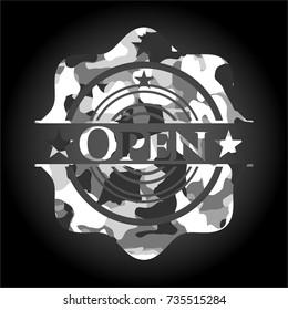 Open on grey camo texture