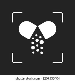 Open pill icon. White object in camera autofocus on dark background