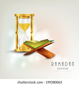 Open religious holy book Quran Shareef with golden sand watch on shiny colorful background for holy month of Muslim community Ramadan Kareem. 