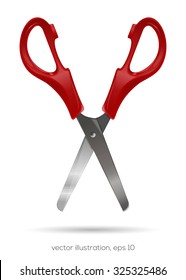Open scissors with plastic red handles on a white background.