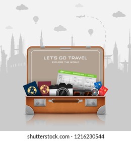 Open suitcase with vacation luggage accessories