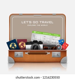 Open suitcase with vacation luggage accessories
