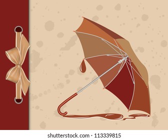 Open umbrella on vintage background