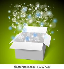 Open white gift box on the snow. Christmas green background.