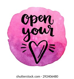 Open your heart. Hand drawn calligraphic quote on a watercolor background.