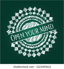 Open your Mind chalk emblem written on a blackboard