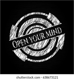 Open your Mind chalk emblem written on a blackboard