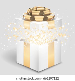 Opened Gift Box With Gold Bow And Confetti