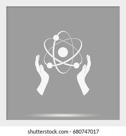 Opened hands holding atom sign.
