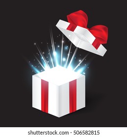 Opened realistic gift box with red bow and abstract light. Vector illustration