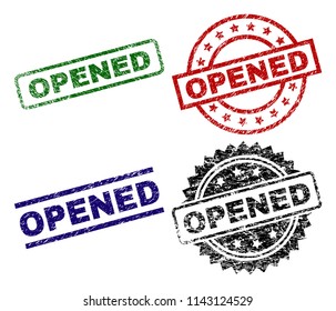 OPENED seal prints with damaged surface. Black, green,red,blue vector rubber prints of OPENED title with corroded surface. Rubber seals with round, rectangle, medallion shapes.