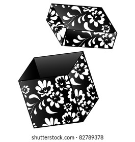 opened vintage gift box with floral decoration in black and white