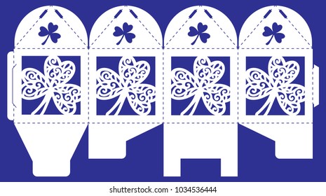 Openwork box with lace ornament. Vector bonbonniere for st. Patrick's day. Laser cutting template for holiday. Silhouette of Irish shamrock.