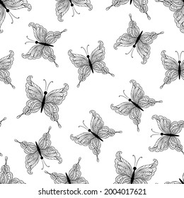 Openwork butterflies of dark color on a white background. Seamless pattern.