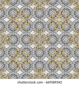 Openwork delicate golden pattern. Brilliant lace, stylized flowers, paisley. Seamless pattern on gray background with golden elements. Vector oriental style arabesques. Seamless golden texture curls.