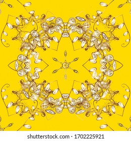 Openwork delicate golden pattern. Oriental style arabesques. Seamless golden texture curls. Brilliant lace, stylized flowers, paisley. Vector. Seamless pattern on yellow colors with golden elements.
