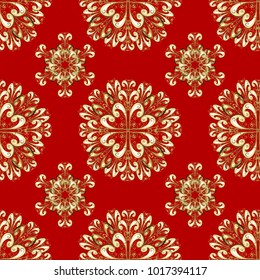 Openwork delicate pattern. Brilliant lace, stylized flowers, paisley. Vector. Seamless golden texture curls. Oriental style arabesques. Seamless pattern on red and yellow colors with golden elements.