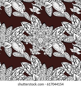 Openwork delicate white pattern. Seamless pattern on brown background with white elements. Seamless white texture curls. Brilliant lace, stylized flowers, paisley. Vector. Oriental style arabesques.