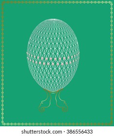 Openwork Easter egg decorated with pearls in a gold frame